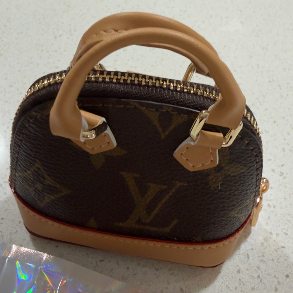 Authentic upcycled micro Louis Vuitton handbag charm